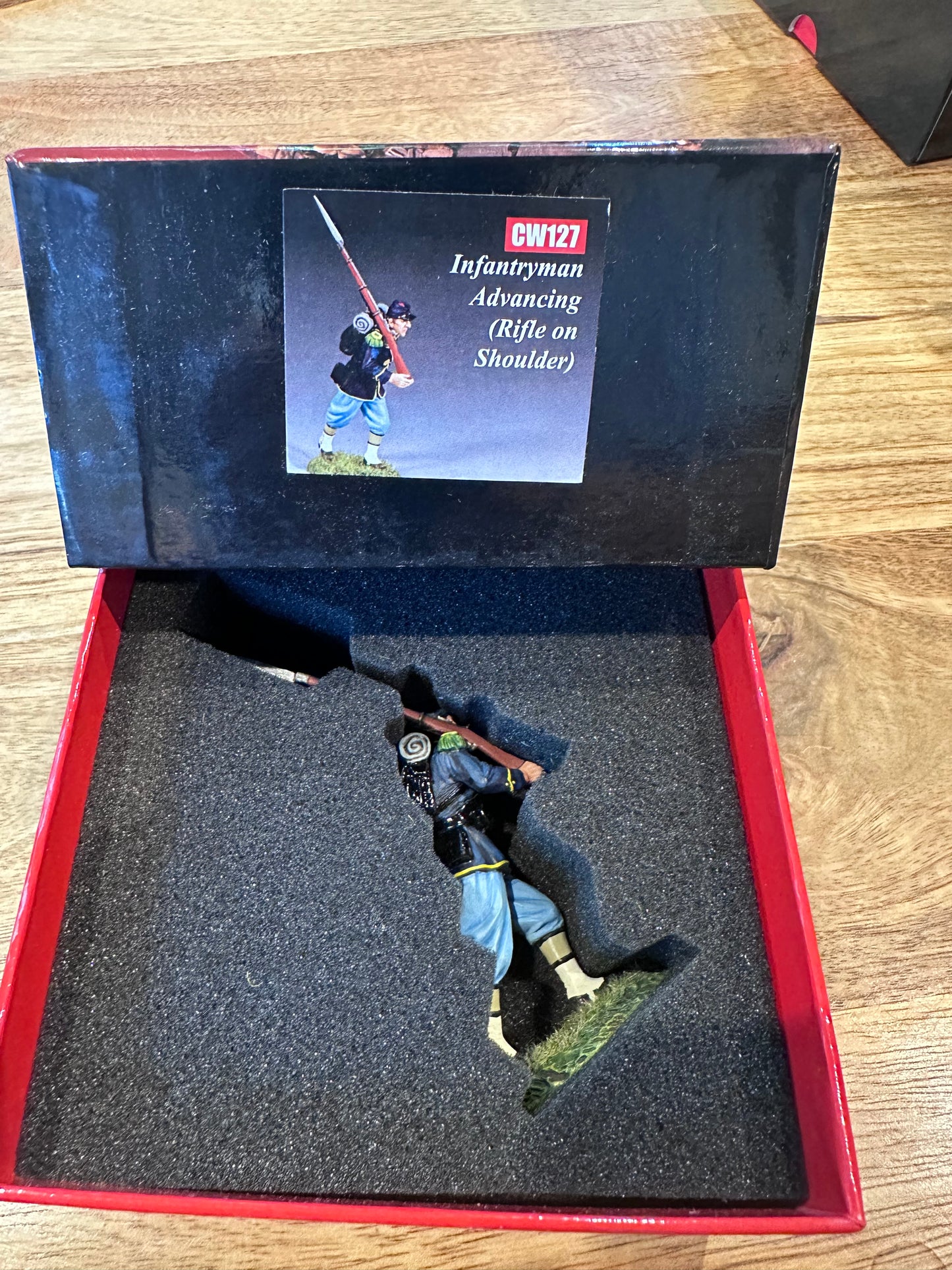 Infantry Advancing presented in a classic red collector box.
