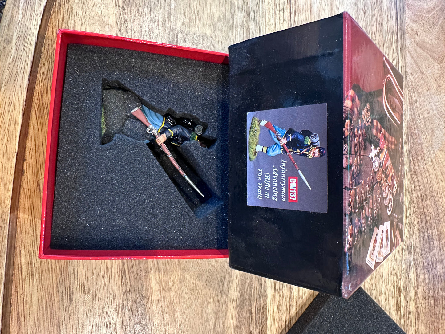 Infantryman Advancing presented in a classic red collector's box.