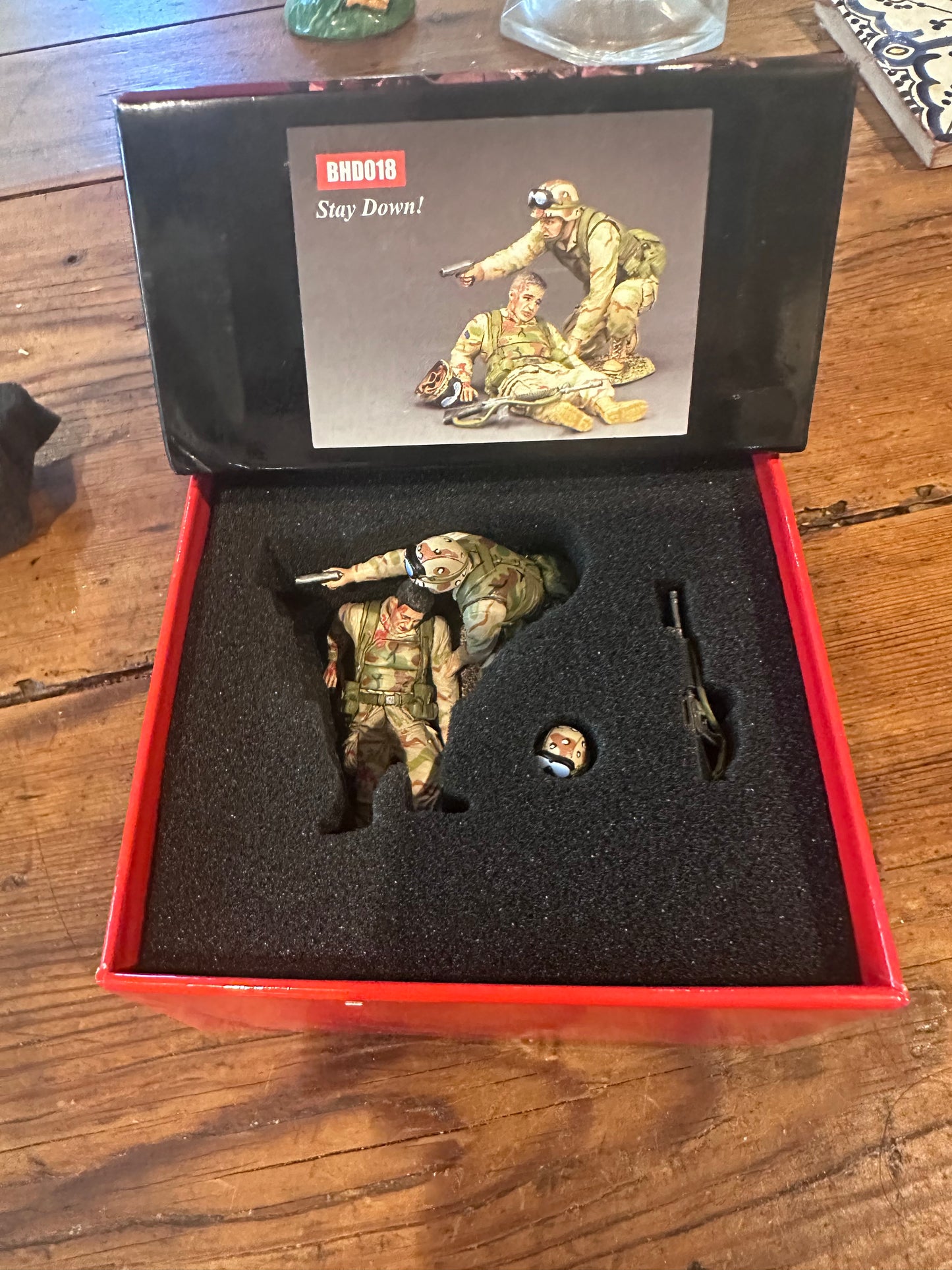 Stay Down presented in a classic red collector's box.