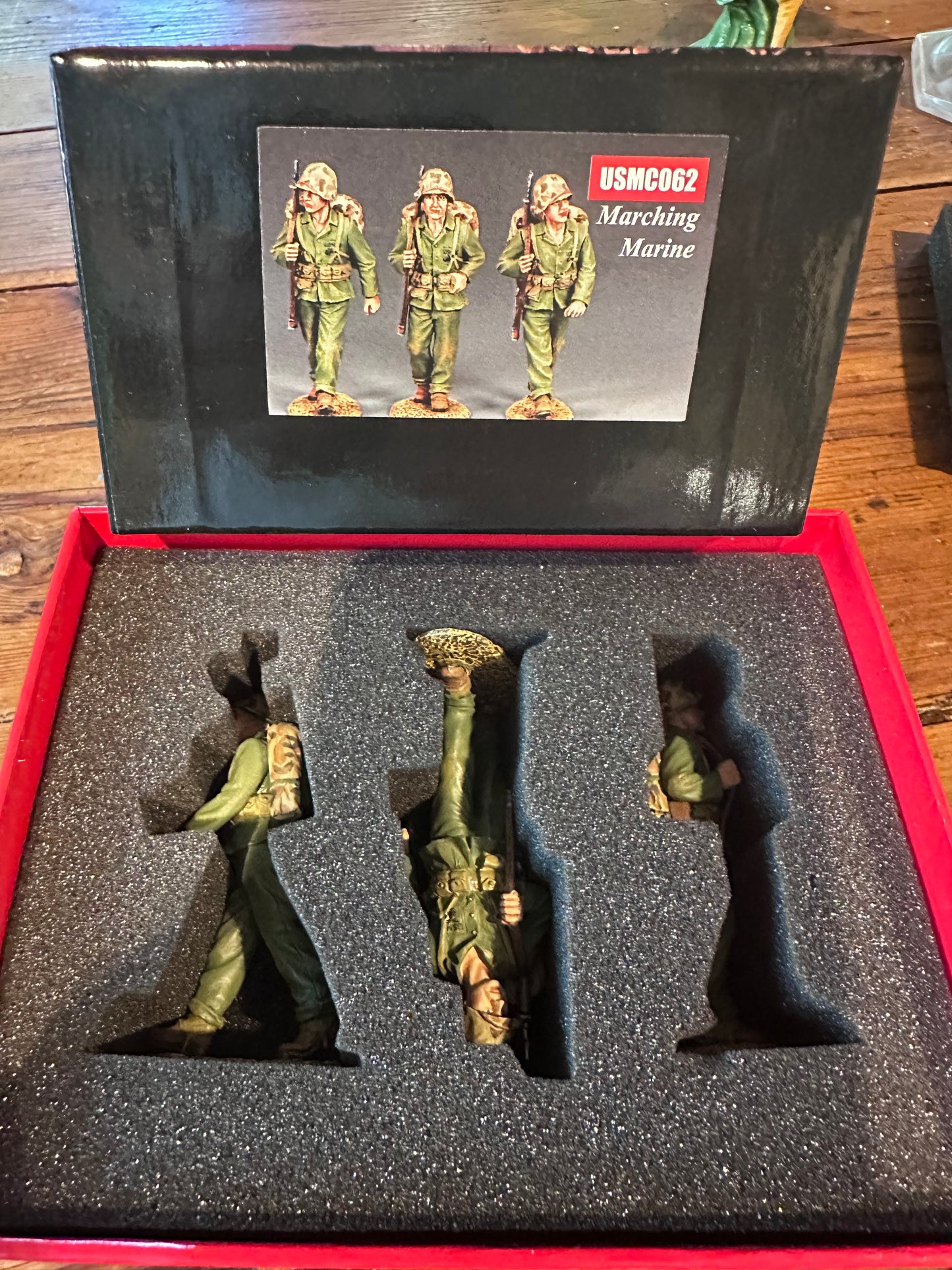 Marching Marines presented in a classic red collector's box