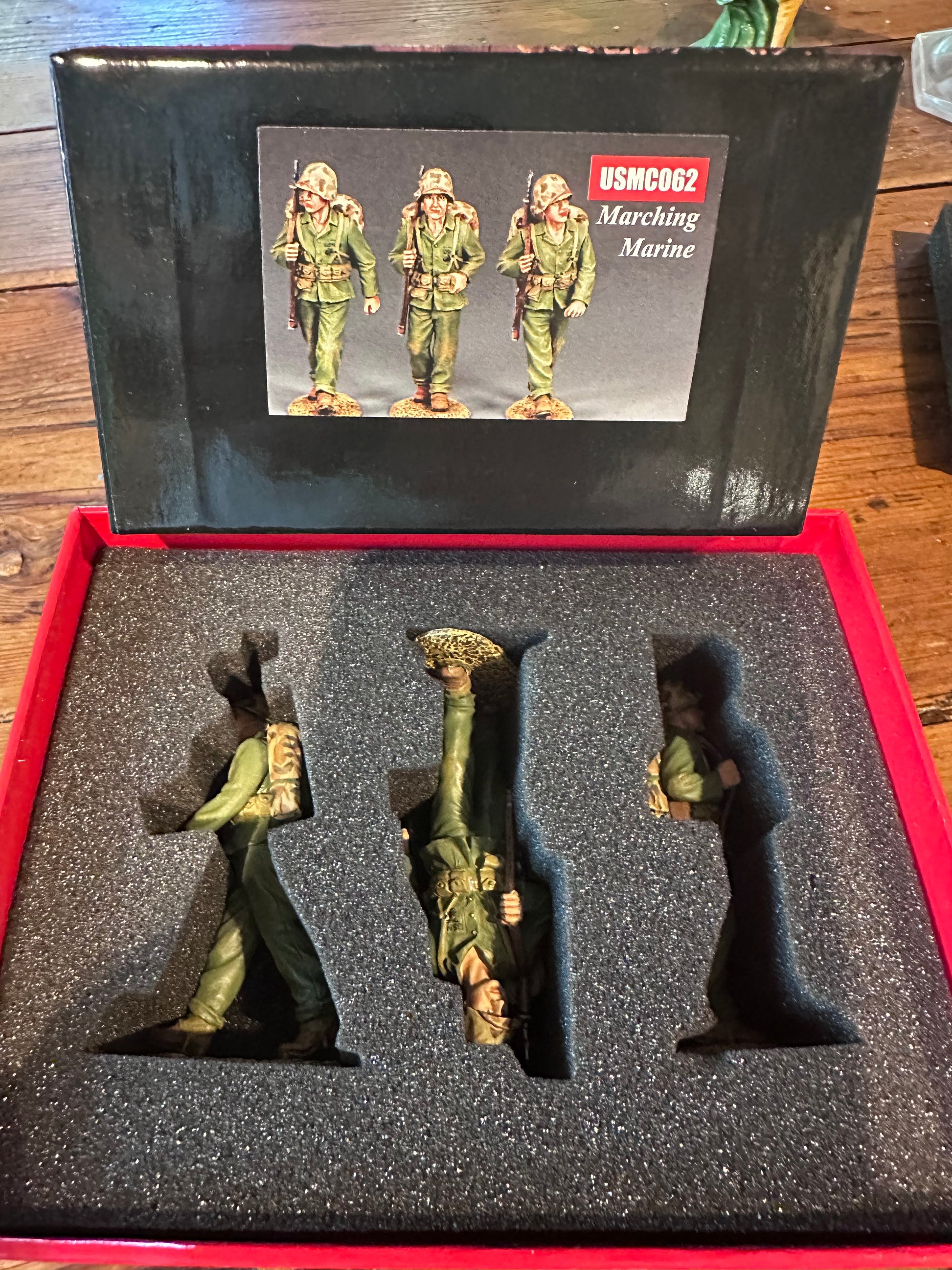 Marching Marines presented in a classic red collector's box