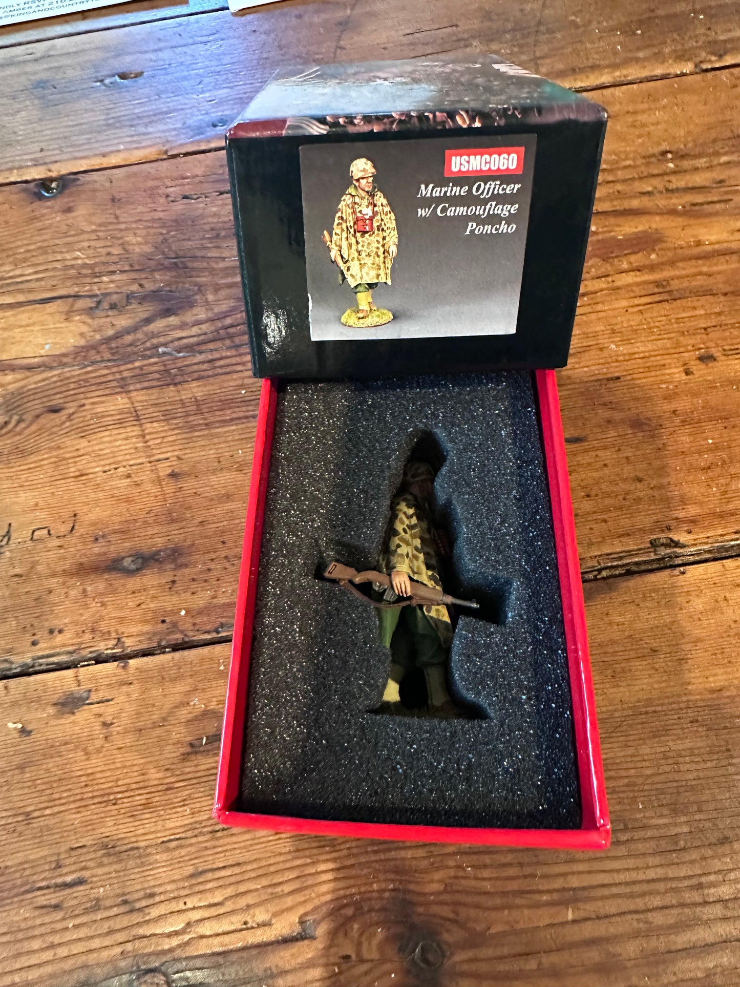 Marine Officer w/Camouflage Poncho. Presented in a classic red collectors box.