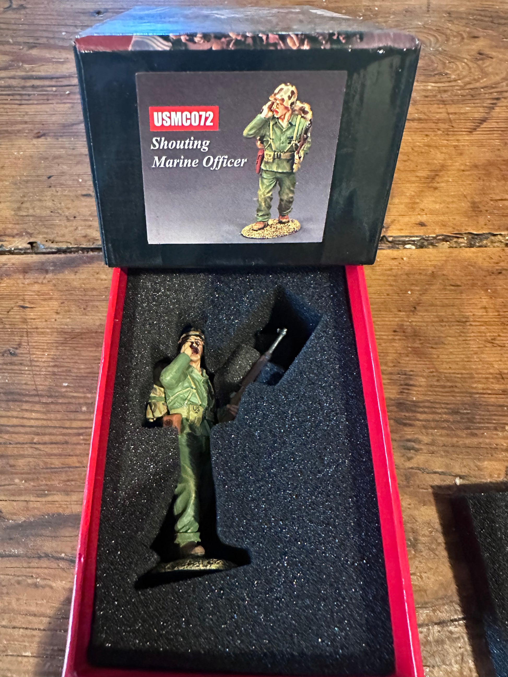 Shouting Marine Officer presented in a classic red collector's box.
