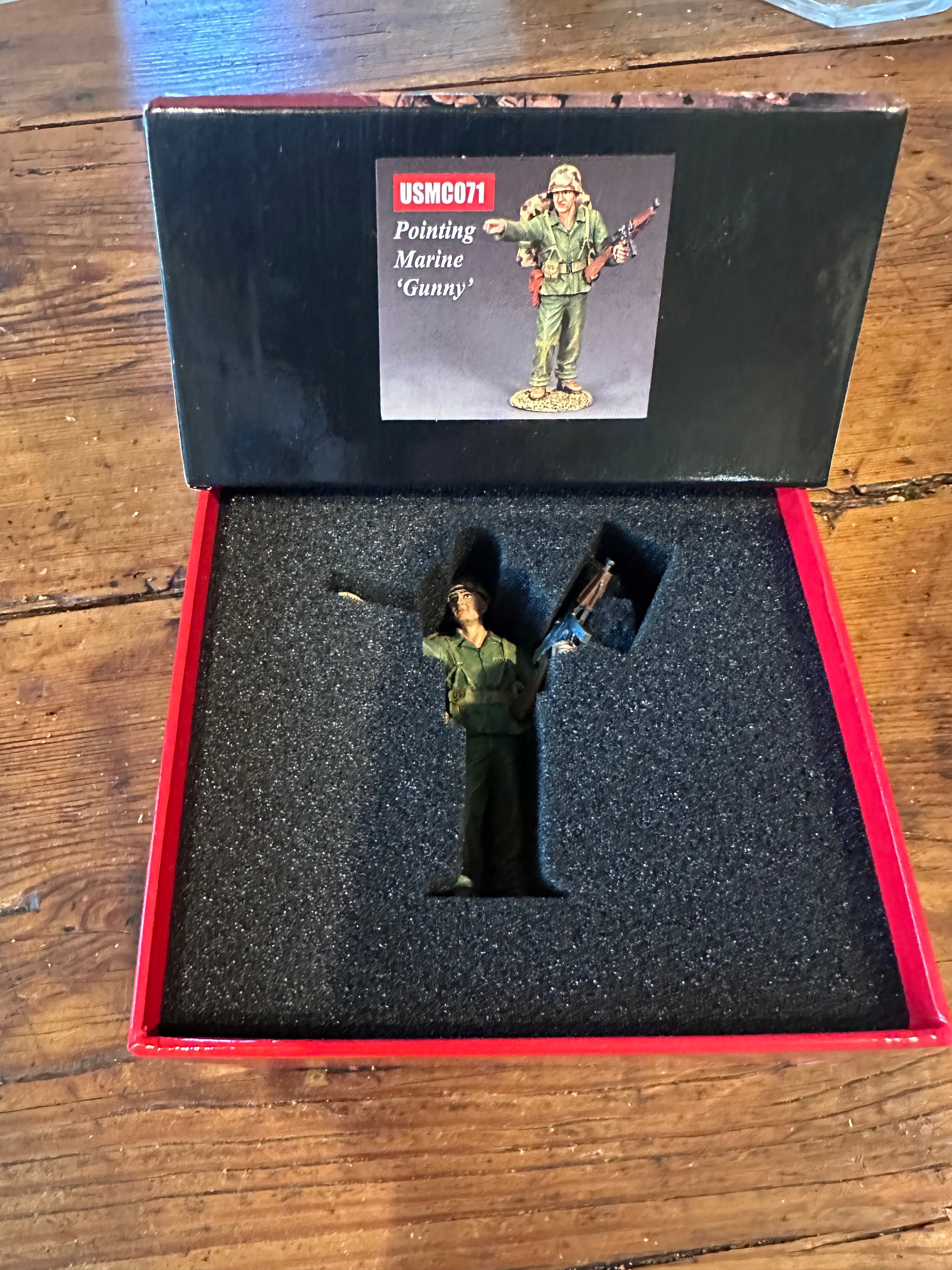 Pointing Marine 'Gunny' presented in a classic red collector's box.