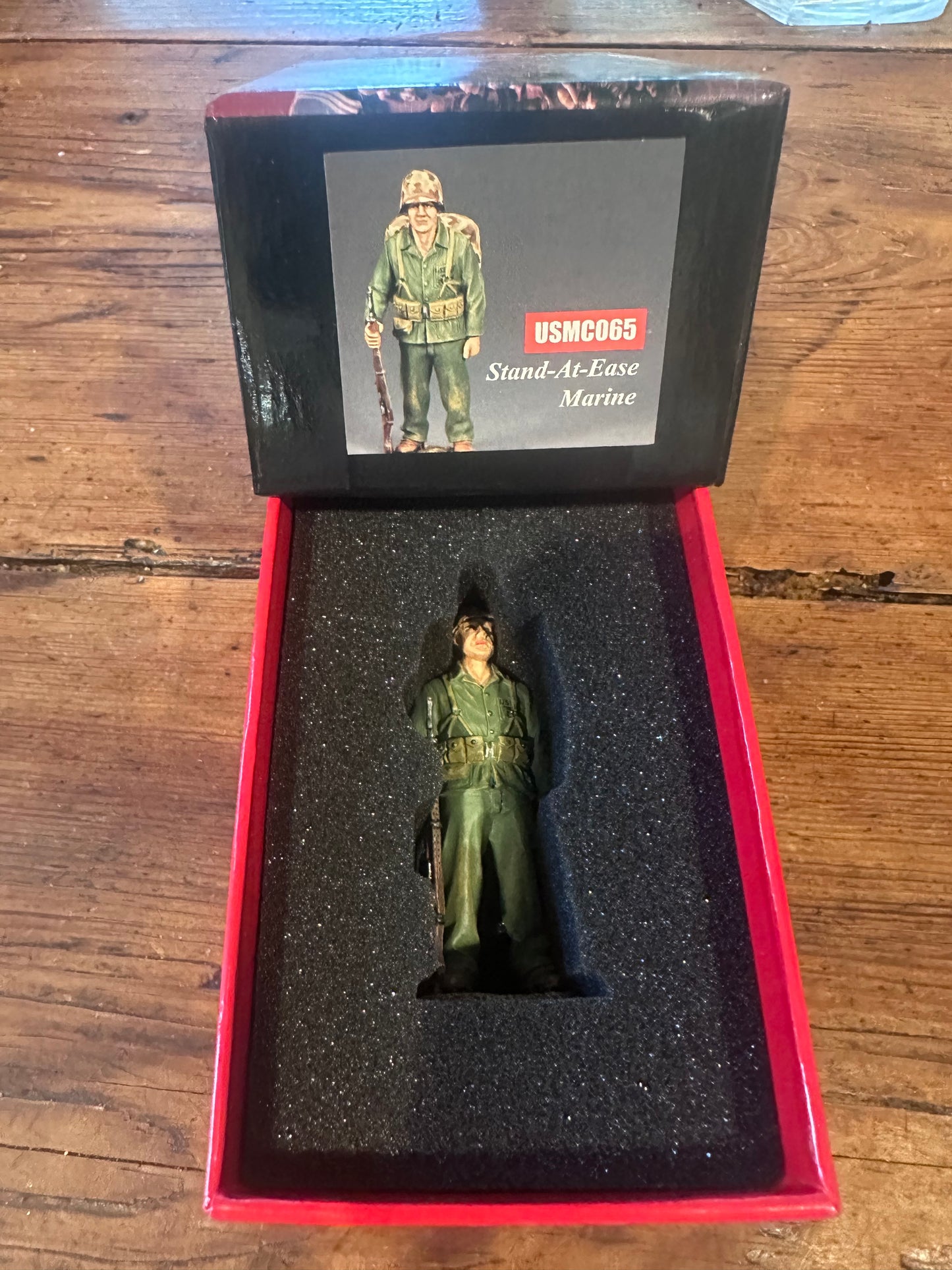 Stand At Ease Marine present in a classic red collectors box.