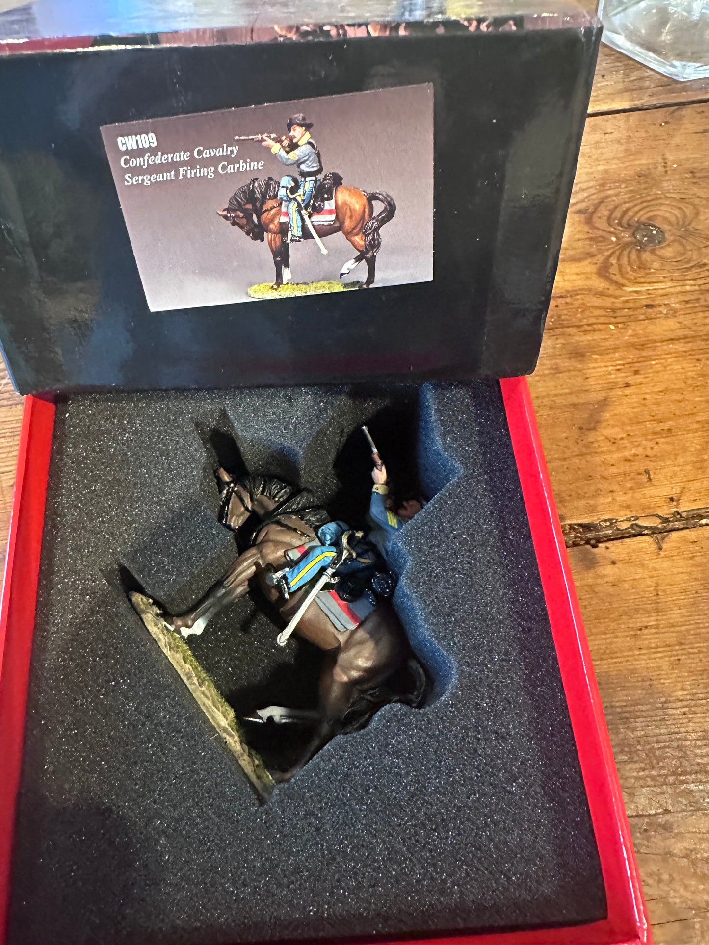 Confederate Cavalry Sgt. Firing Carbine presented in a classic red collectors box.