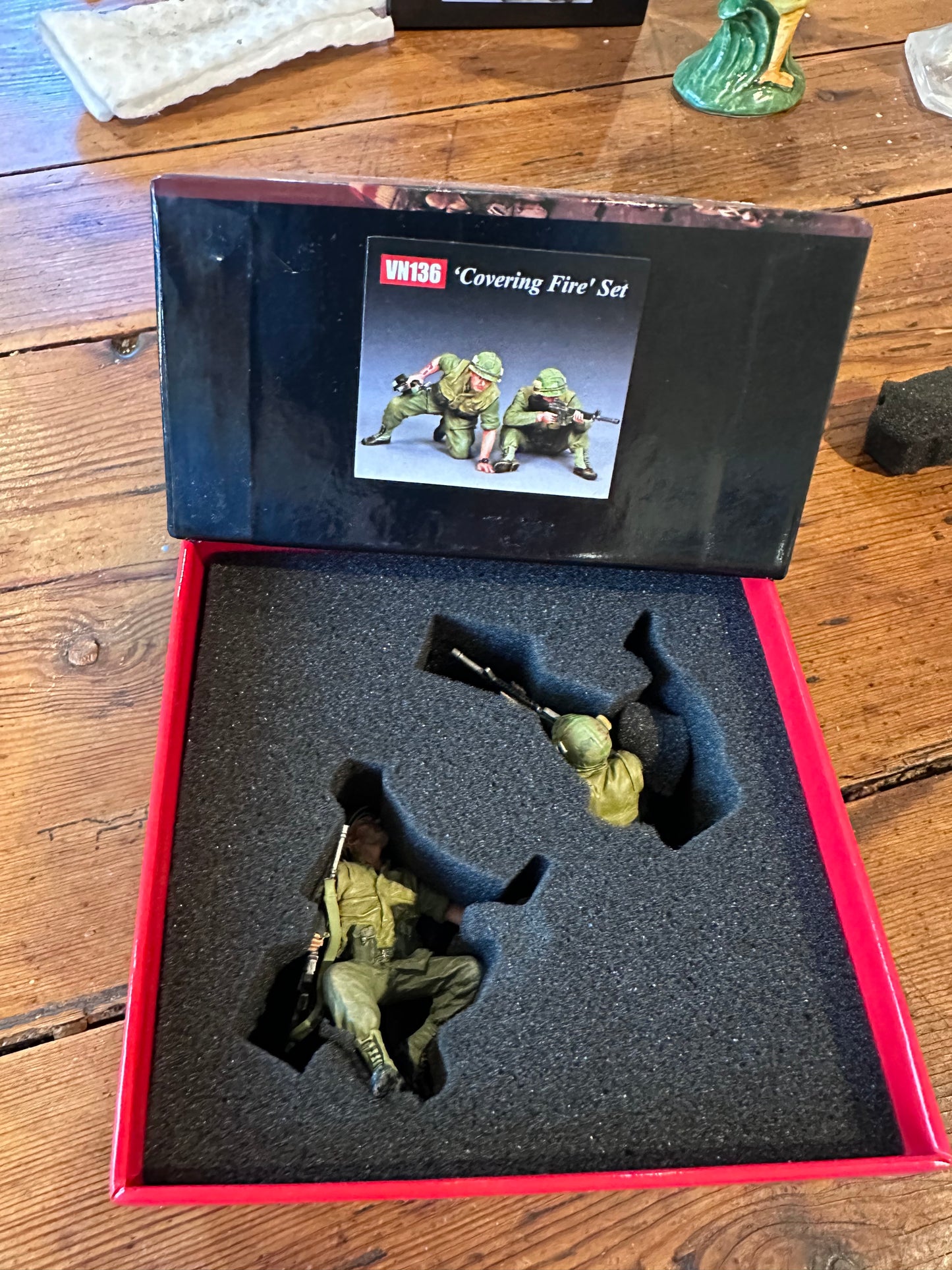 Covering Fire toy soldier set presented in a classic red collectors box.