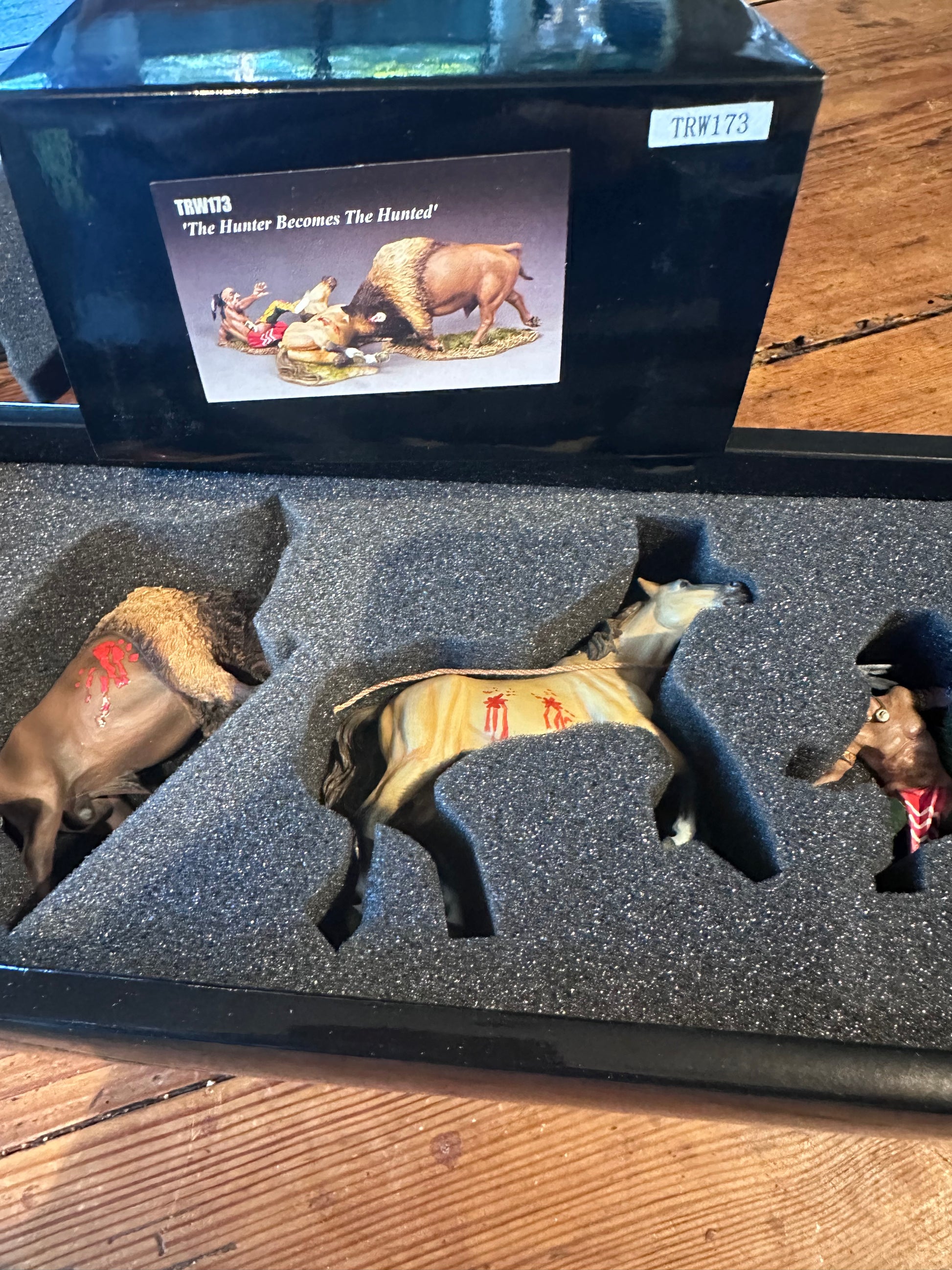 The Hunter Becomes the Hunted packaged in a black collectors box.