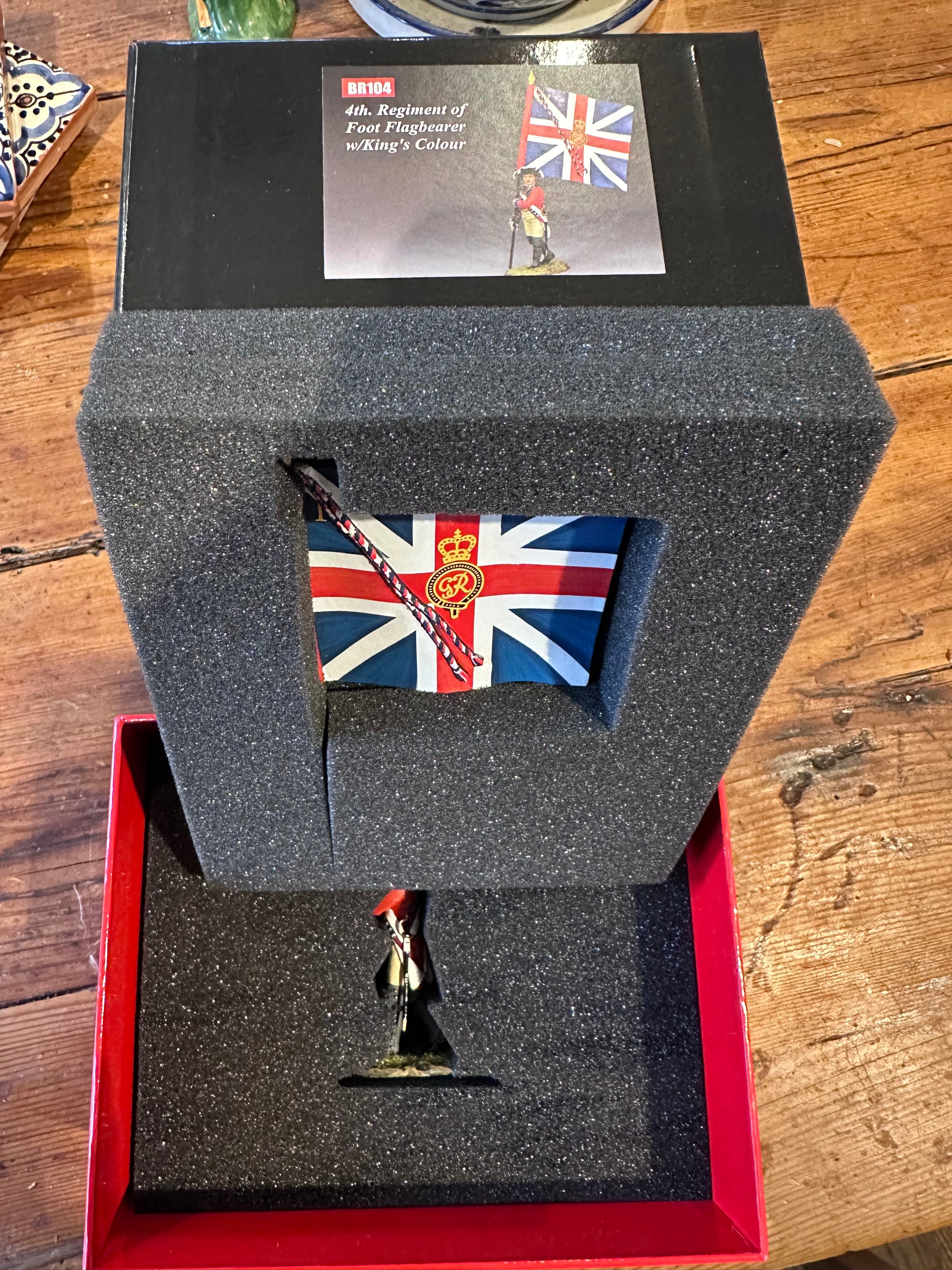 Presented in a classic red collectors box.