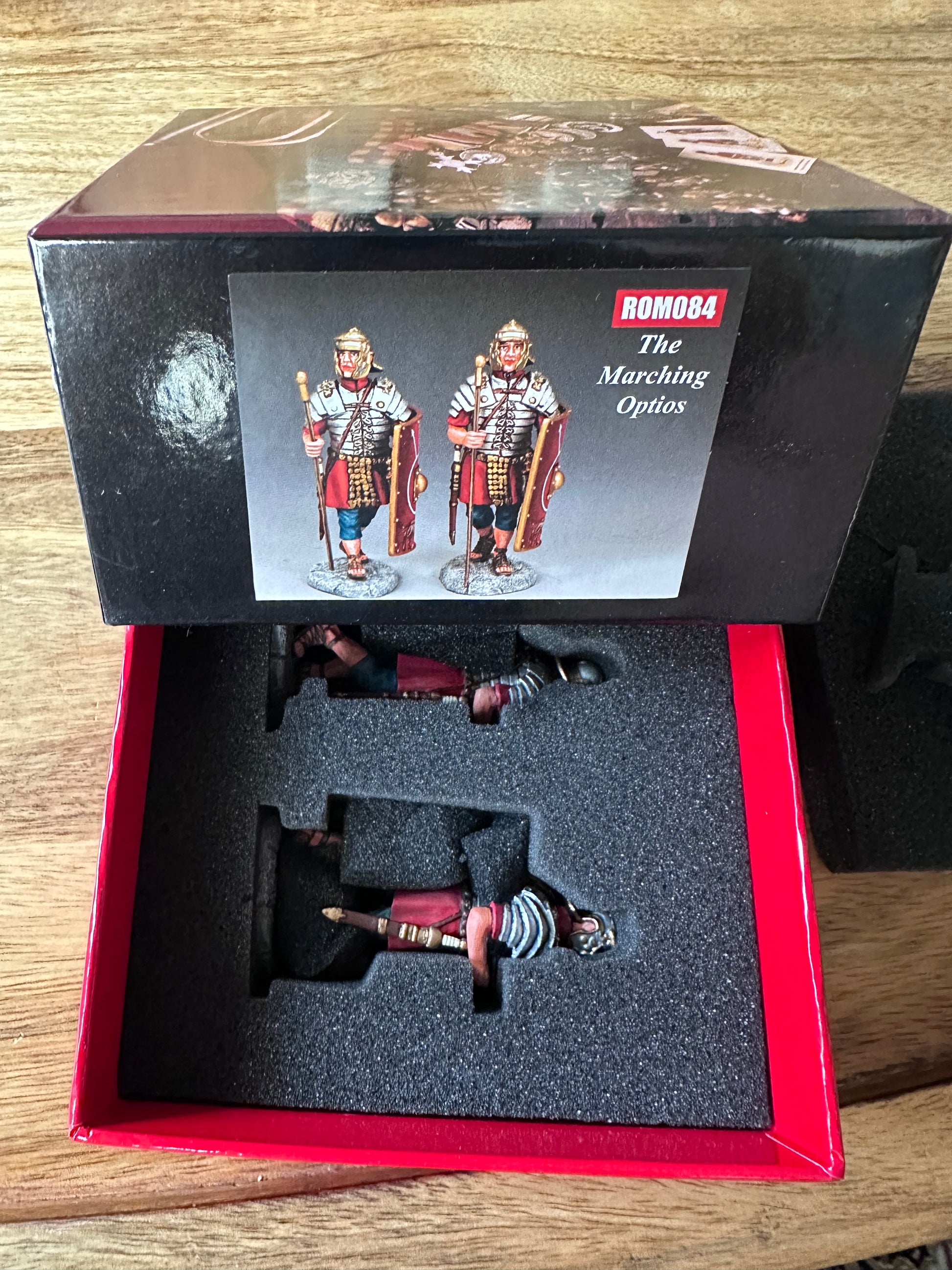 The Marching Optios packaged in a classic red collectors box