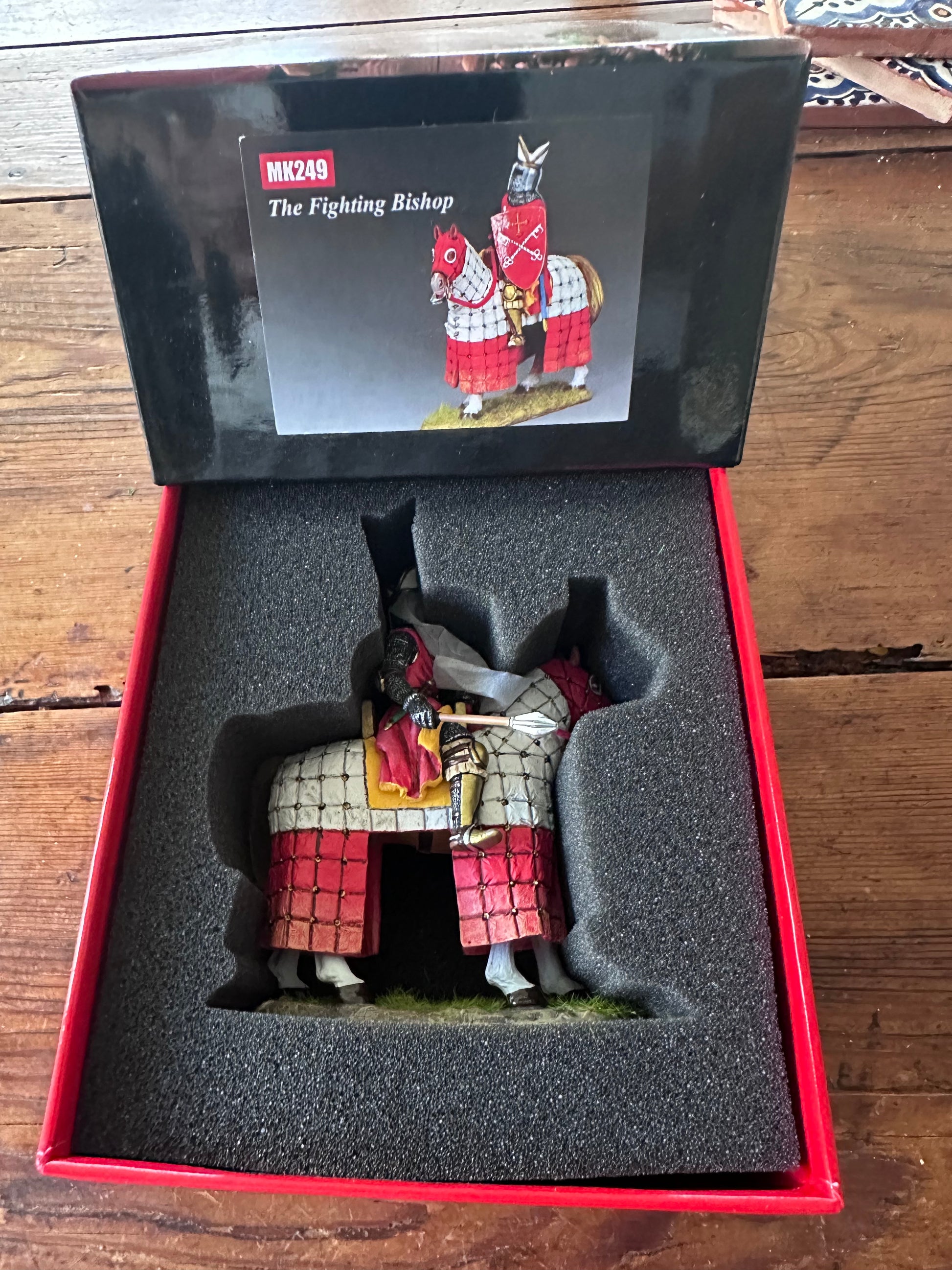 The Fighting Bishop presented in a classic red collectors box.