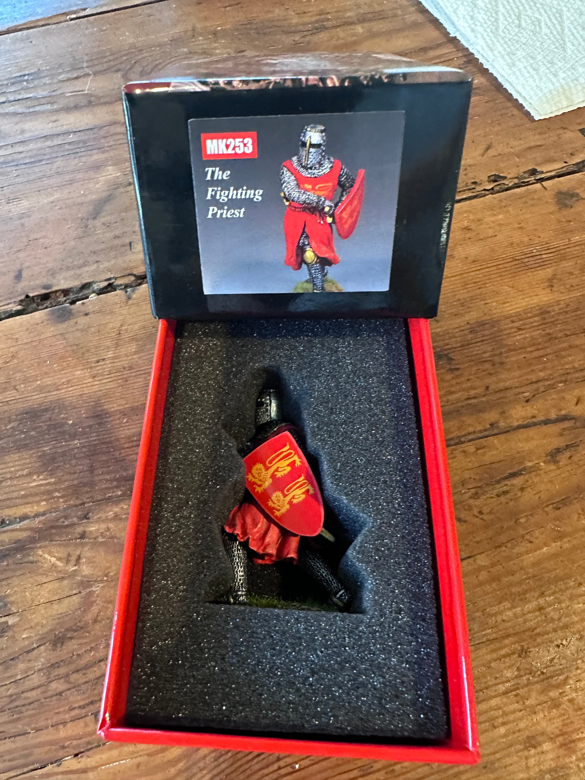 The Fighting Priest presented in a classic red collectors box