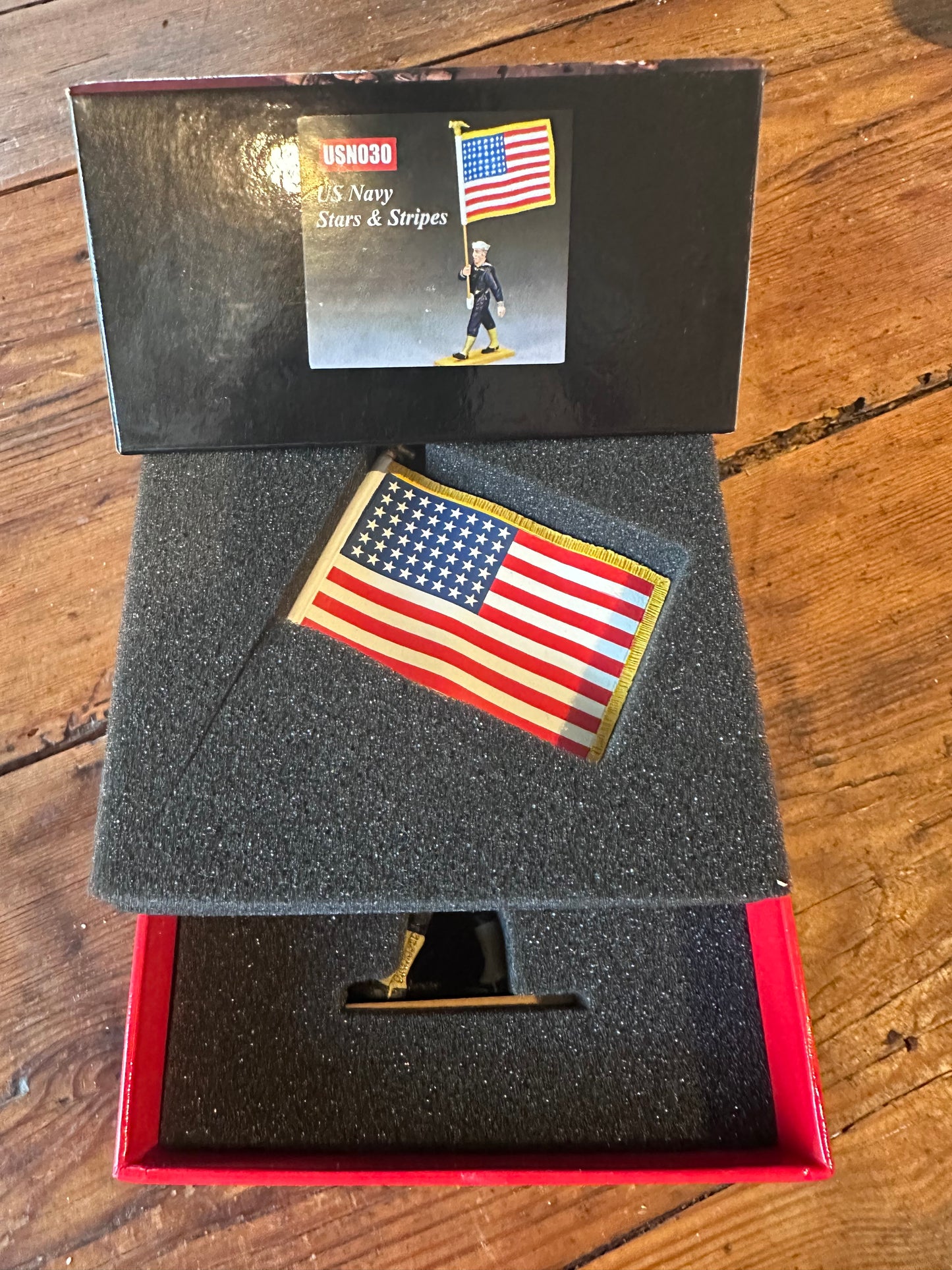 U.S. Navy Stars & Stripes presented in a classic red collectors box