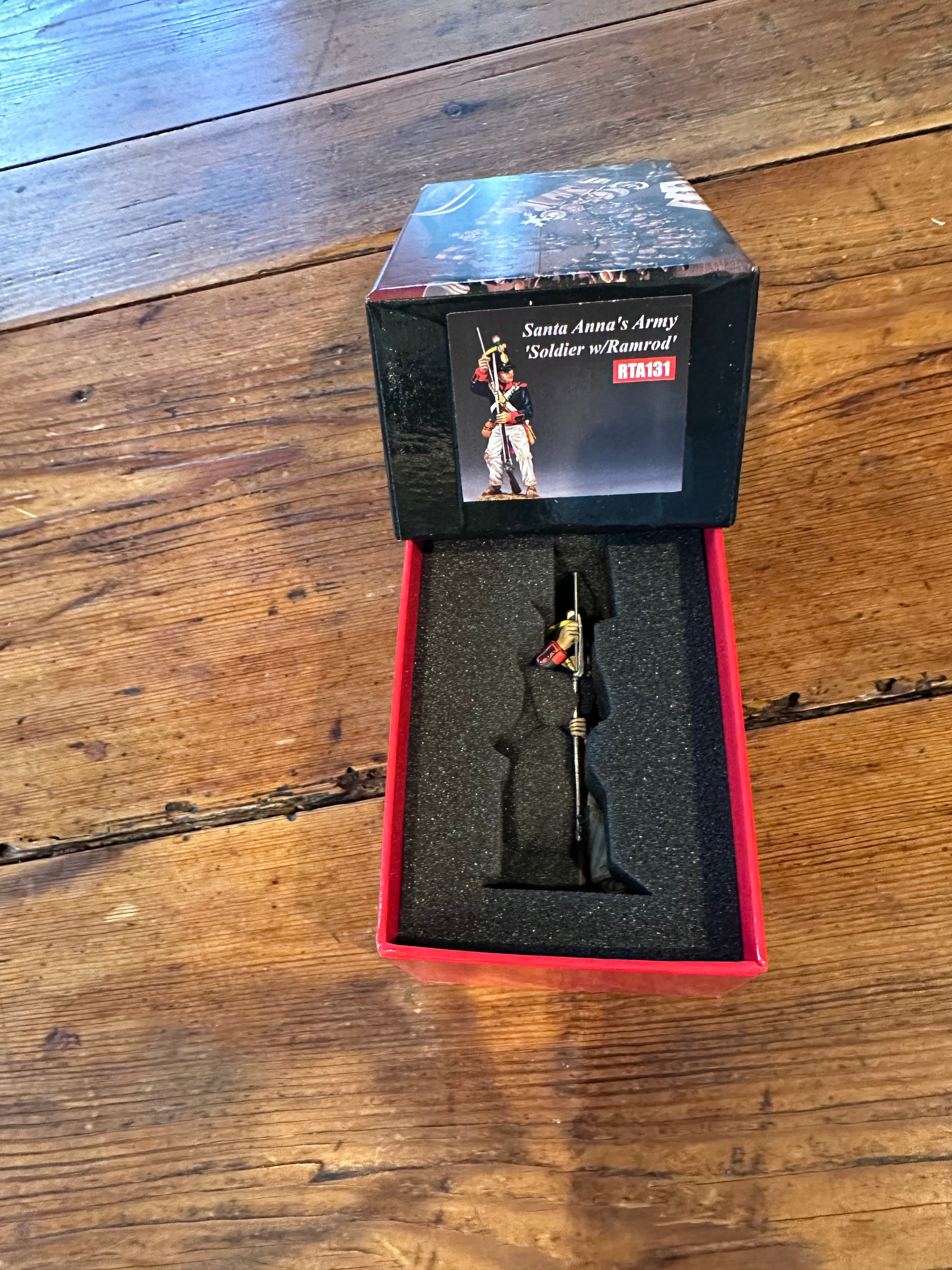 Santa Anna's Soldier using His Ramrod military miniature packaged in a red collector box