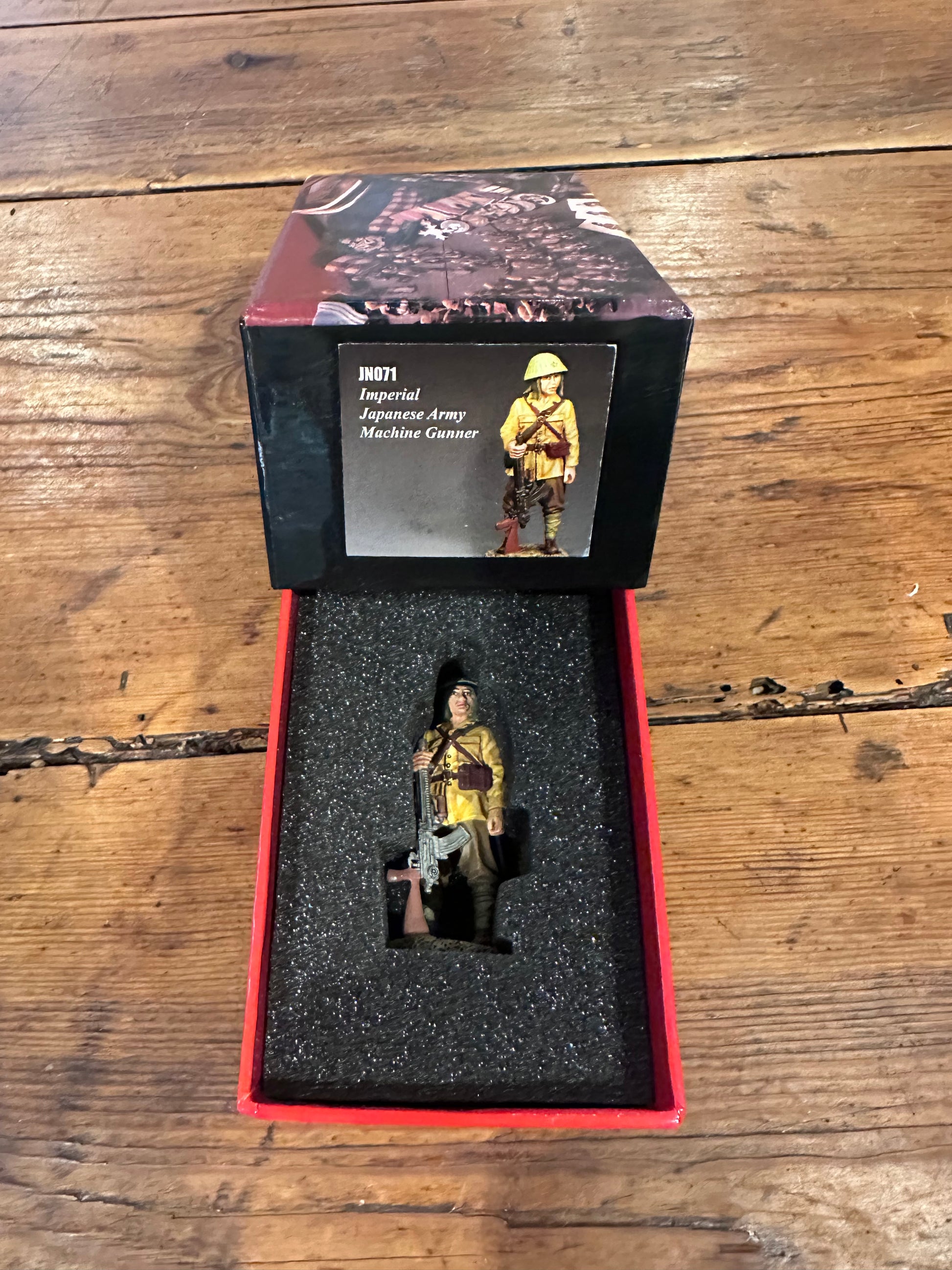 Standing I.J.A. Machine Gunner JN)71 military miniature packaged in a classic red collector box