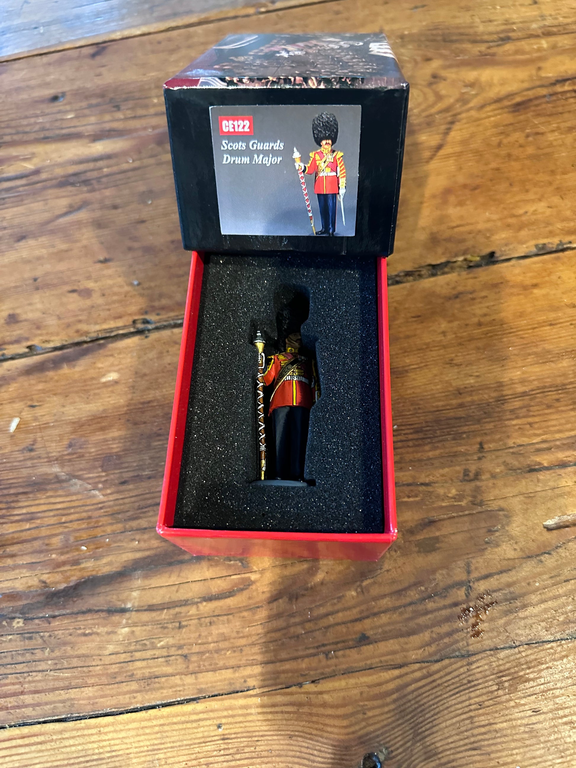 CE122 Scots Guards Drum Major military miniature packaged in a classic red collector box.