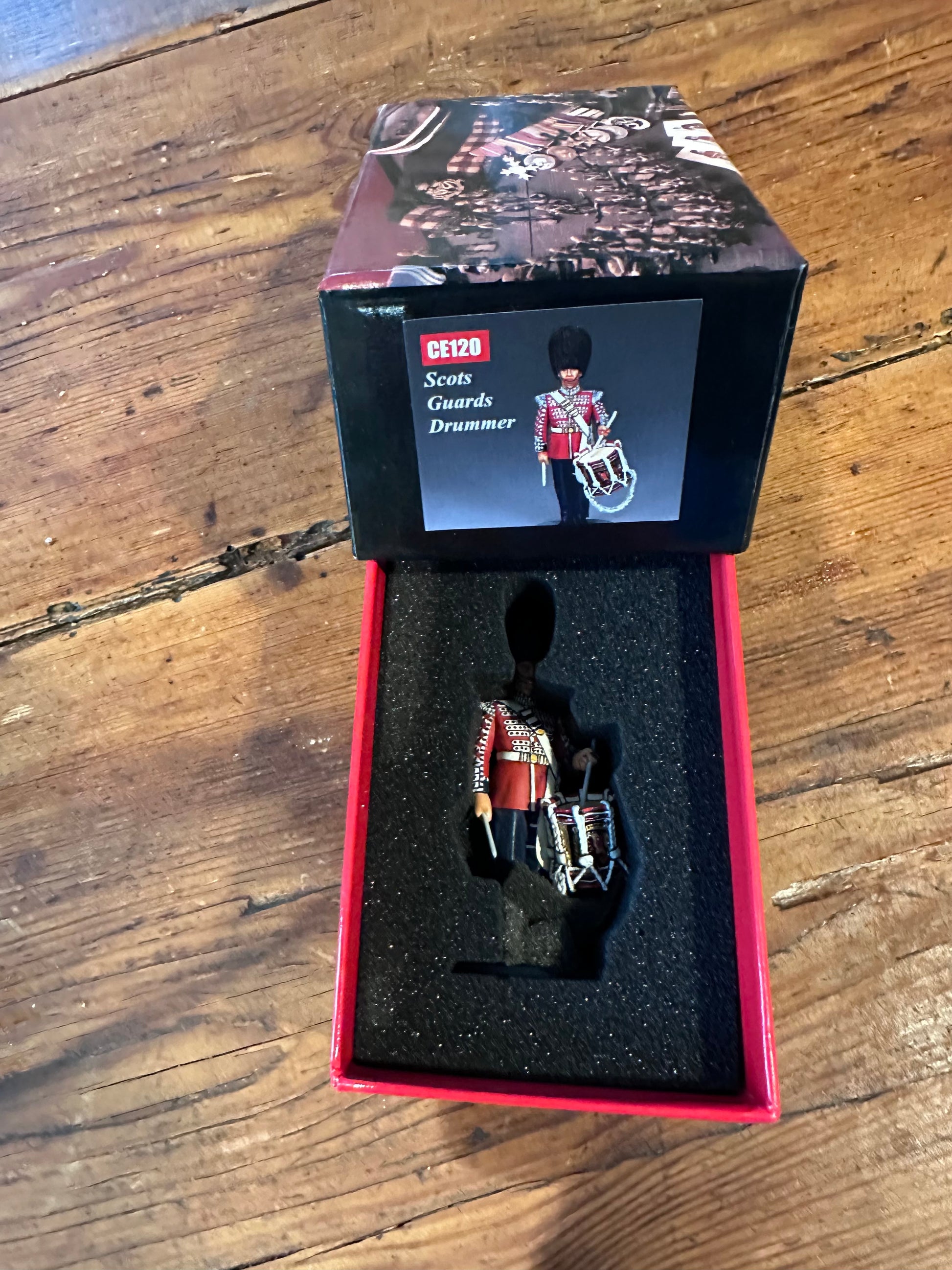 Scots Guards Drummer toy soldier packaged in a classic red collector box