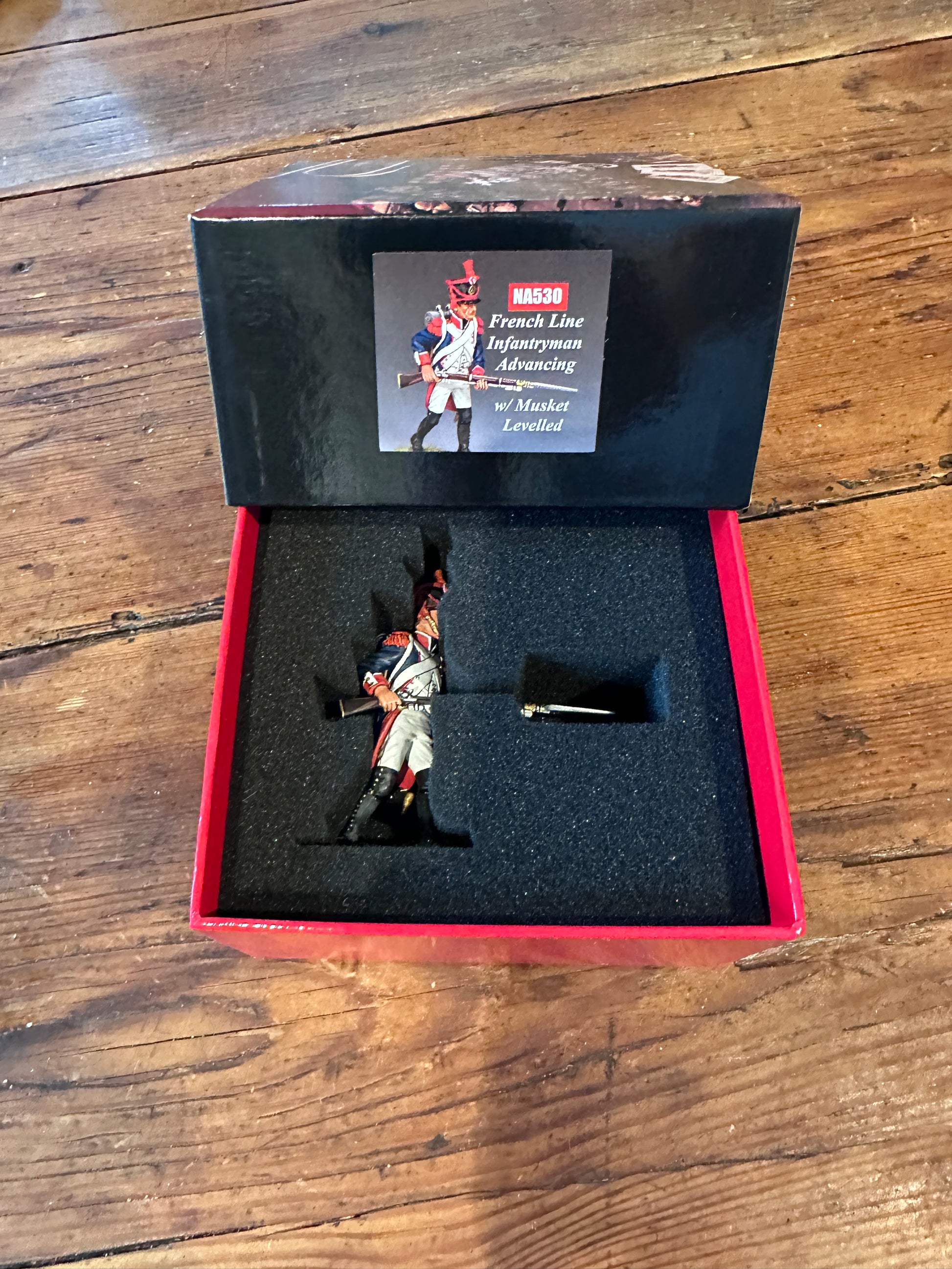 NA530 FLI Advancing w/Musket Levelled packaged in a classic red collector box.