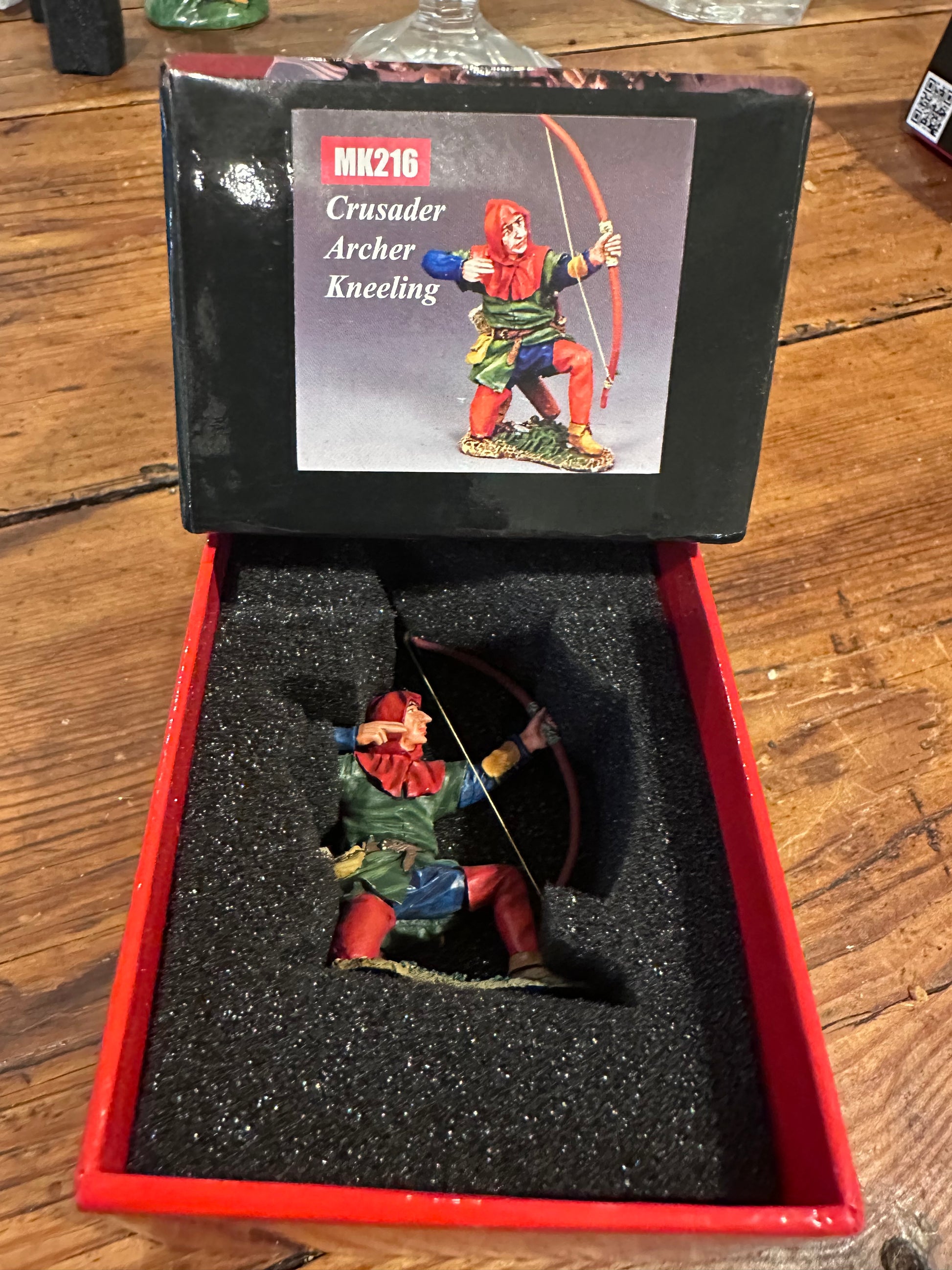Kneeling Crusader Archer presented in a classic red collector's box.