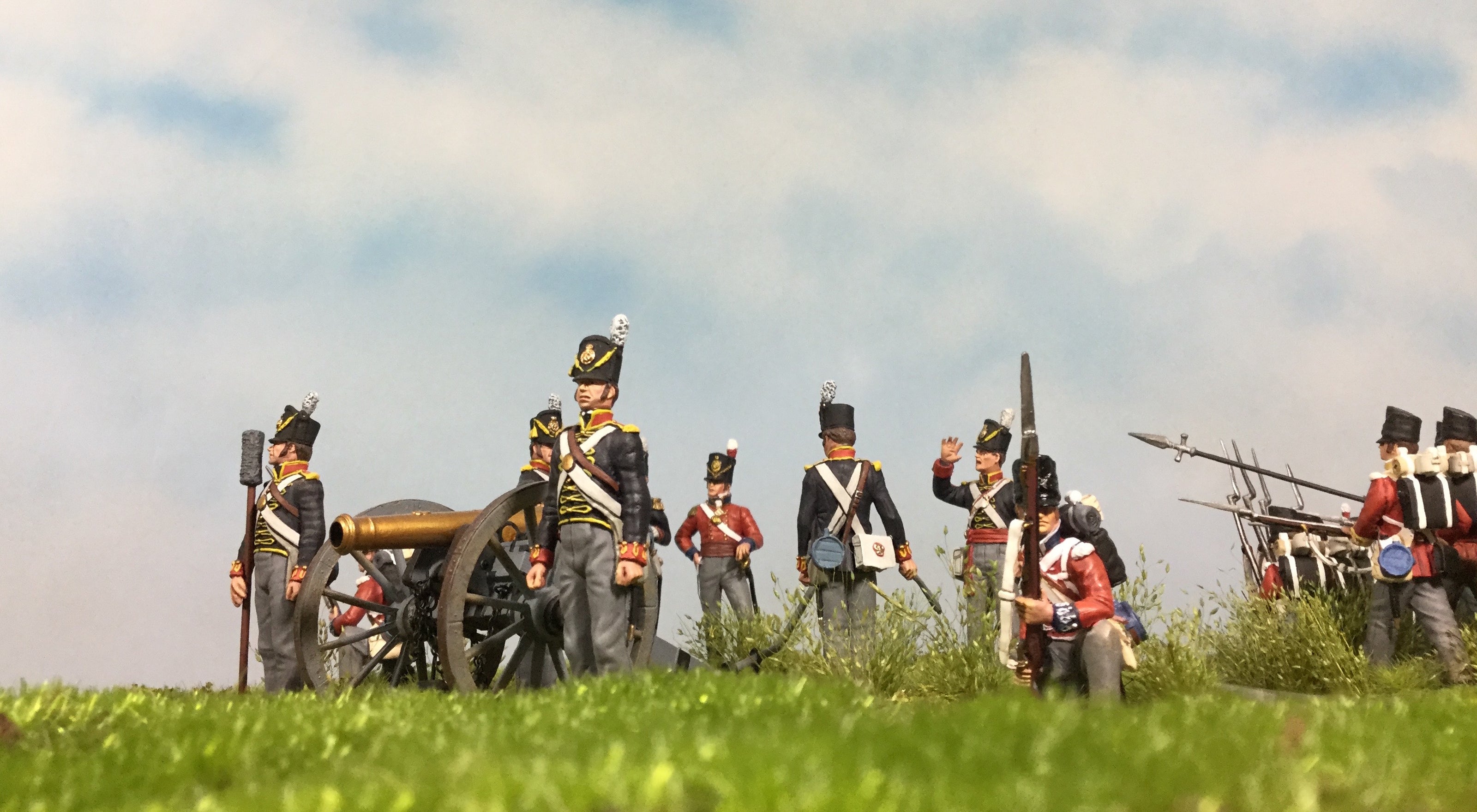 Toy Soldier figurines depicting Napoleonic troops. They have an artillery piece.