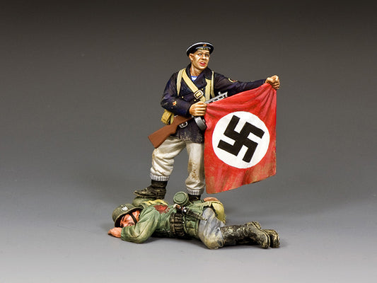 Figurine holding a flag with a swastika symbol on a gray background