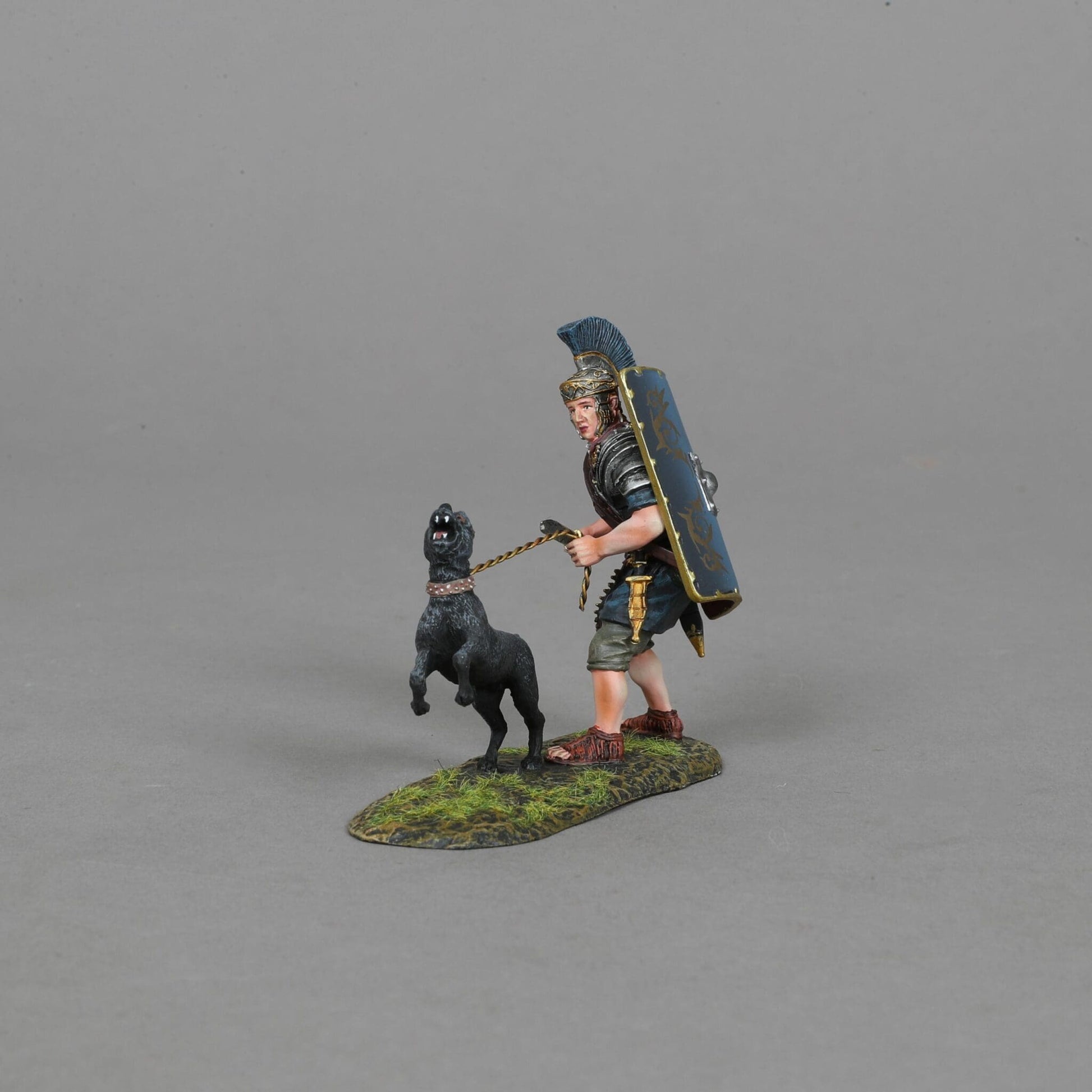 Collectible toy soldier miniature army men Praetorian with War Dog. Dog is held back by a leash.