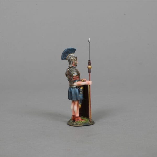 Side view of Collectible toy soldier army men miniature figurine Praetorian Guard. Blue shield and spear.