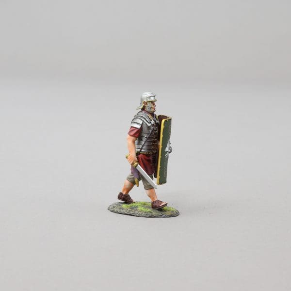 Collectible toy soldier miniature army men Advancing Legionnaire. He is wearing armor.