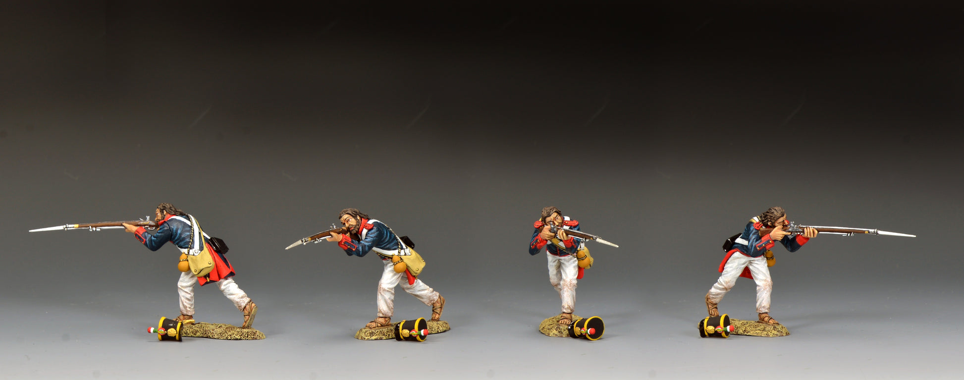 Toy Soldier King & Country S.A.A. Soldier Advancing Firing, Mexican line infantryman firing bayoneted musket with shot-off shako on ground at his feet, blue coatee with red facings, Alamo 1836, 1/30 60mm matte figure, RTA142 military miniature