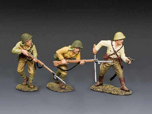 Three Japanese soldiers charge forward; officer leads with pistol and sword, two riflemen follow with bayonets fixed, mid-battle.