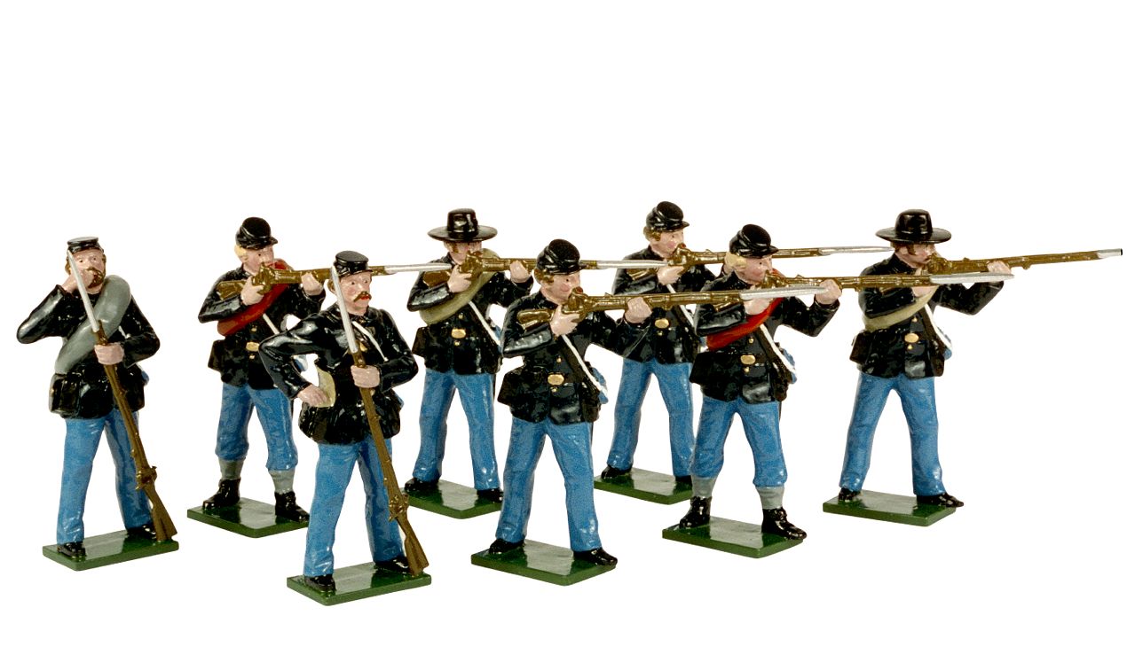Eight toy soldiers in blue pants and dark jackets, standing on green bases, hold rifles in various poses as if ready for battle. Some aim their rifles forward, while others are at rest.