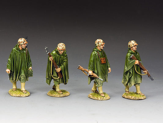 Four WWII U.S. Marines in rain ponchos on patrol with M1s and BAR in hand. 1/30 scale matte-finished figures.