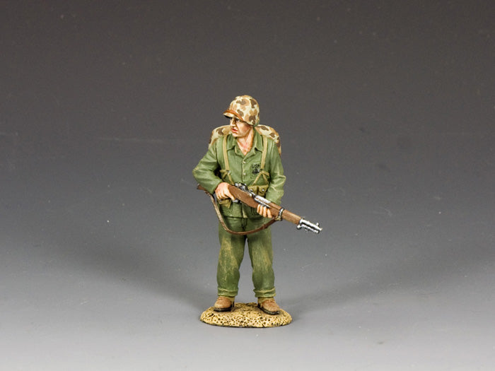 1/30 scale WWII U.S. Marine standing with M1 Garand rifle at the ready, wearing camo helmet and field pack. Matte finish.