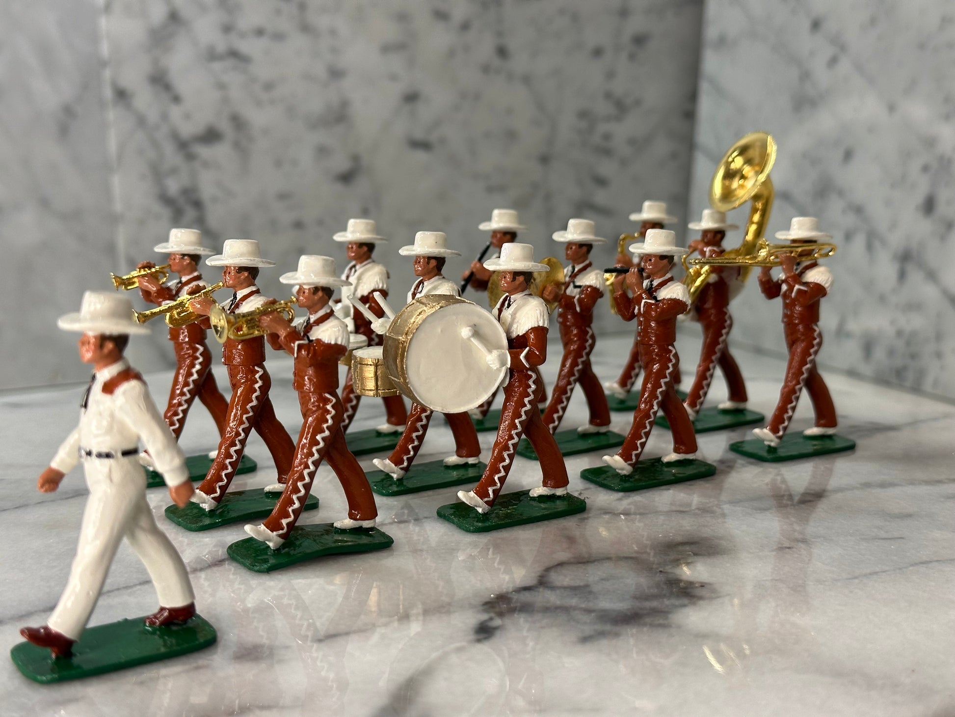 Collectible toy soldier army men University of Texas marching band side view.