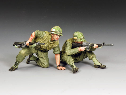 Vietnam War Marines in combat—one fires his M16 while the other, wounded, prepares to move. 1/30 scale matte toy soldier set.