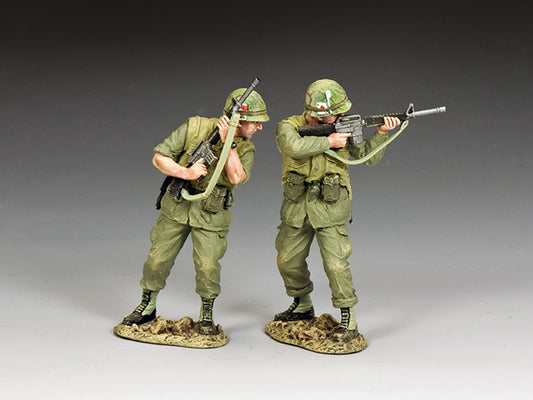 Two U.S. Marines cautiously advance with M16s raised, scanning for danger. 1/30 scale Vietnam War toy soldiers, matte finish.