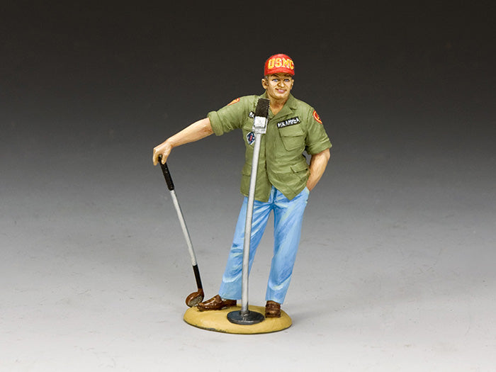 Civilian figure of USO performer in USMC shirt and cap, leaning on golf club and mic. Vietnam War tribute. 1/30 scale, matte finish.