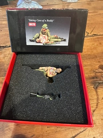 Taking Care of a Buddy presented in a classic red collectors box.