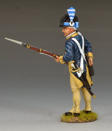 A painted military miniature of a Revolutionary War soldier stands holding a musket with a bayonet. He wears a blue coat, tan pants, a red vest, a white crossbelt, and a black hat with a blue and white plume.