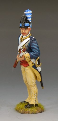Model of a historical soldier in uniform with a rifle on a gray background