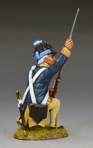 Model figure of a historical soldier in blue uniform with a rifle and helmet on a gray background