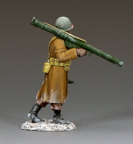 Side view of 1/30 scale WWII U.S. Army winter GI carrying a Bazooka over his shoulder with a rocket in hand, matte finish toy soldier by King & Country.