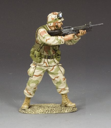 Ranger Firing M16A2/M203. Military miniature figure in military uniform with rifle on a gray background