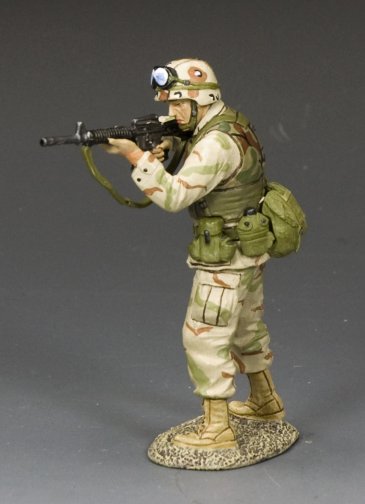 Desert-uniformed U.S. Army Ranger military miniature aiming M16A2 rifle forward in combat stance during the 1993 Battle of Mogadishu
