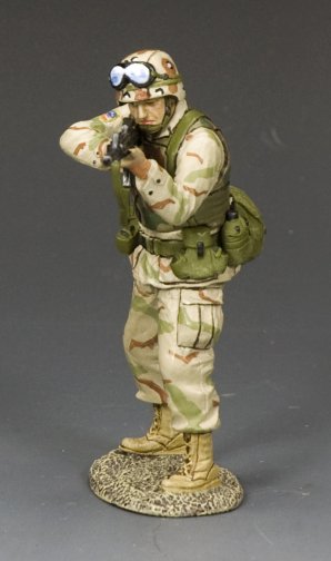 Ranger Fire His M16A2. toy soldier figure of a soldier in camouflage uniform with equipment on a gray background