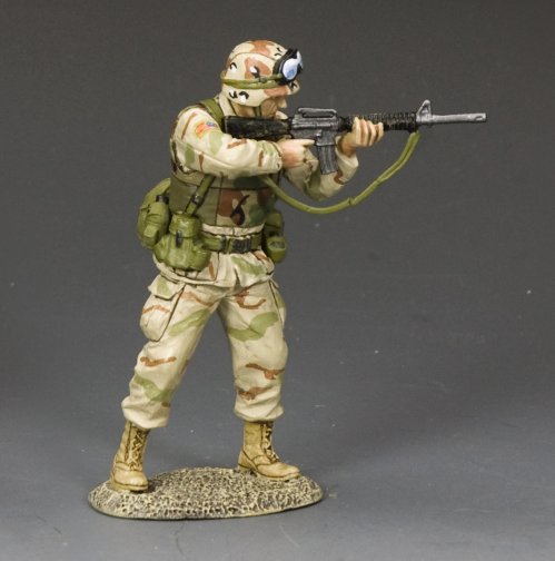 Ranger Fire His M16A2. Camouflage soldier military miniature holding a rifle on a gray background