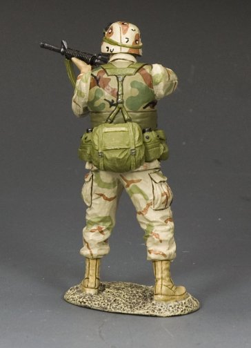 Ranger Fire His M16A2. Camouflage military figurine holding a weapon on a gray background