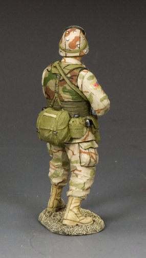 Ranger with M249 SAW military miniature of a soldier in camouflage uniform with backpack on a gray background