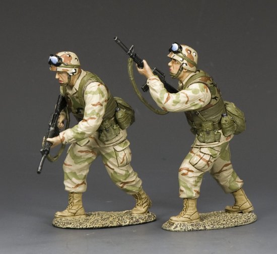 Ranger Advance to Contact. Two military miniatures in camouflage uniforms with rifles on a gray background