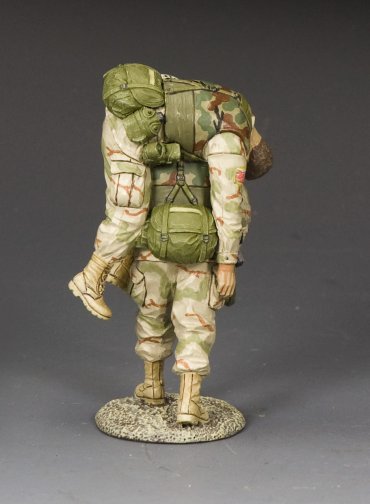 Rear view of Model of a soldier with a backpack on a gray background